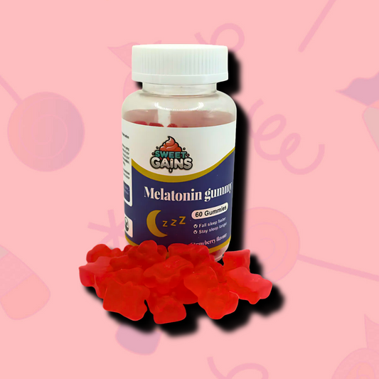 A blue and white bottle  with a moon on the label and a group of red gummies are spread in front of the bottle.